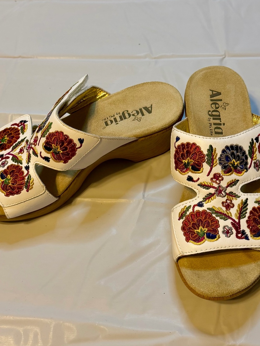 Alegria White Embroidered Floral Wedge Mules